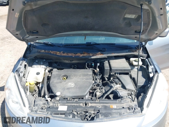 2012 Mazda Mazda5 Grand Touring with VIN JM1CW2DL2C0129518, listed as a IAAI auction lot 41872136 with 129,323 mi miles. Bid and sale history available at carsss.com. Image 10.