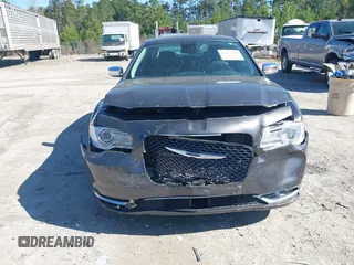 2017 Chrysler 300 C with VIN 2C3CCAEG4HH590991, listed as a IAAI auction lot 41827109 with 85,711 mi miles and . Bid and sale history available at DreamBid. Image 6.