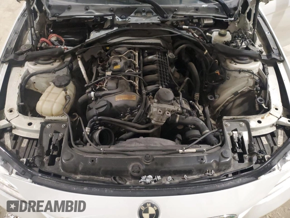 2013 BMW 3 Series 335i with VIN WBA3A9G51DNP36712, listed as a Copart auction lot 52407465 with 117,972 mi miles and Salvage title. Bid and sale history available at DreamBid. Image 11.