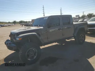 2022 Jeep Gladiator Rubicon с VIN 1C6JJTBG9NL101774, выставлен на аукционе Copart как лот 74597074 с пробегом 11 903 миль миль и Списание • Salvage title. История ставок и продаж доступна на DreamBid. Изображение 1.