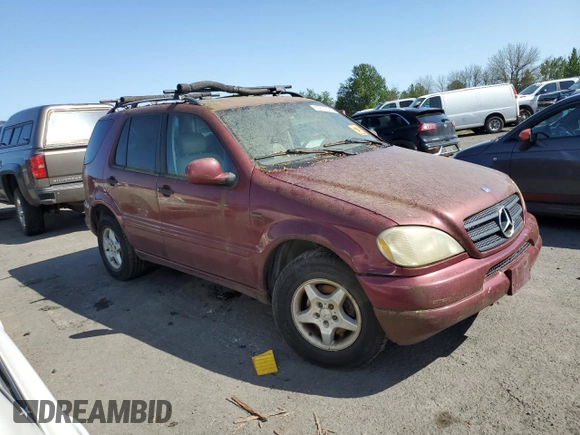 2001 Mercedes-Benz M 320/430/500 with VIN 4JGAB54E91A256176, listed as a Copart auction lot 55610525 with 215,120 mi miles and Salvage Title. Bid and sale history available at DreamBid. Image 4.