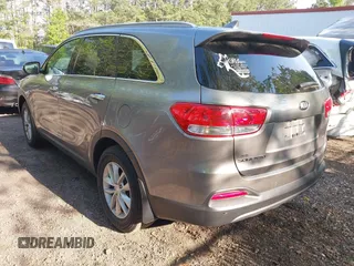 2017 Kia Sorento LX with VIN 5XYPG4A36HG279857, listed as a IAAI auction lot 42115007 with 112,592 mi miles. Bid and sale history available at carsss.com. Image 3.