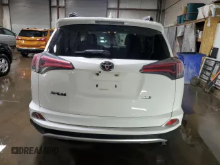 2017 Toyota RAV4 XLE with VIN JTMWFREV7HJ701268, listed as a Copart auction lot 49098185 with 79,314 mi miles and Salvage Title. Bid and sale history available at DreamBid. Image 6.
