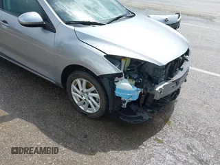 2012 Mazda 3 i Touring with VIN JM1BL1V71C1677133, listed as a IAAI auction lot 41991234 with 104,610 mi miles and . Bid and sale history available at DreamBid. Image 13.