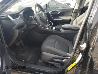2019 Toyota RAV4 LE with VIN JTMH1RFV8KD039728, listed as a Copart auction lot 59669035 with 100,355 mi miles and Salvage title. Bid and sale history available at DreamBid. Image 7.