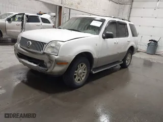 2003 Mercury Mountaineer Convenience with VIN 4M2ZU66K63ZJ53905, listed as a IAAI auction lot 41689828 with 120,696 mi miles. Bid and sale history available at carsss.com. Image 2.