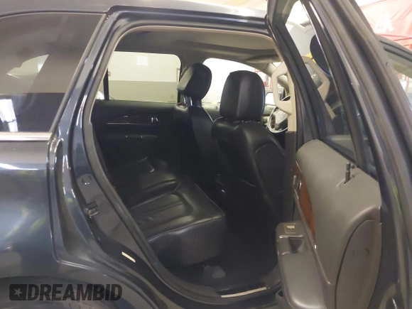 2013 Lincoln MKX with VIN 2LMDJ8JK2DBL18834, listed as a IAAI auction lot 41898580 with 147,543 mi miles and . Bid and sale history available at DreamBid. Image 8.