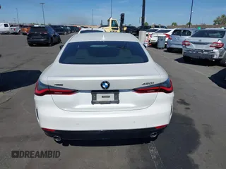 2022 BMW 4 Series 430i xDrive with VIN WBA73AP03NCH61029, listed as a IAAI auction lot 42327779 with 104,860 mi miles and . Bid and sale history available at DreamBid. Image 17.