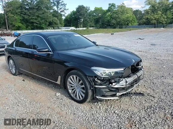 2017 BMW 7 Series 740i with VIN WBA7E2C57HG739482, listed as a Copart auction lot 53652145 with 102,418 mi miles and Salvage title. Bid and sale history available at DreamBid. Image 14.
