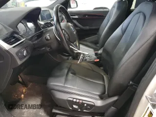 2018 BMW X1 sDrive28i with VIN WBXHU7C32J3H43903, listed as a Copart auction lot 45000375 with 76,158 mi miles and Salvage Title. Bid and sale history available at carsss.com. Image 7.