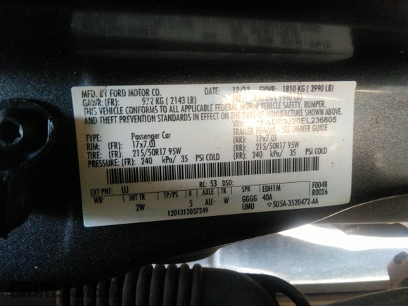 2014 Ford Focus Titanium with VIN 1FADP3J20EL236805, listed as a IAAI auction lot 41708437 with 105,724 mi miles. Bid and sale history available at carsss.com. Image 9.