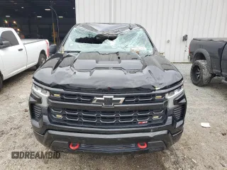 2023 Chevrolet Silverado 1500 LT Trail Boss with VIN 3GCPDFEK7PG106497, listed as a Copart auction lot 75603264 with 28,970 mi miles and Salvage Title. Bid and sale history available at DreamBid. Image 5.