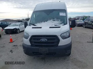 2020 Ford Transit Cargo with VIN 1FTBR3X85LKB51985, listed as a IAAI auction lot 41327206 with 206,896 mi miles and . Bid and sale history available at carsss.com. Image 12.