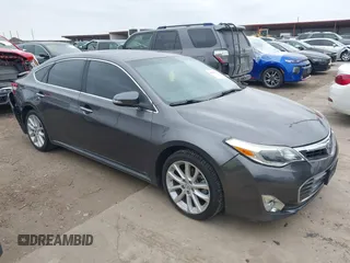 2015 Toyota Avalon Limited with VIN 4T1BK1EB4FU167011, listed as a IAAI auction lot 41582722 with 77,314 mi miles and . Bid and sale history available at DreamBid. Image 1.