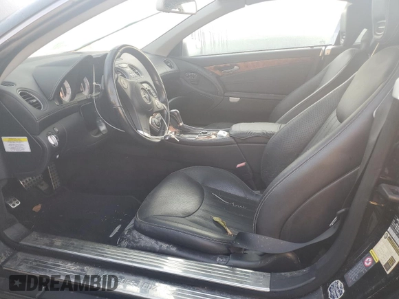 2011 Mercedes-Benz SL 550 z VIN WDBSK7BA3BF162110, wystawiony jako Copart lot #75315214 z przebiegiem Nie podano mil oraz Szkoda całkowita • Salvage title. Historia ofert i sprzedaży dostępna na DreamBid. Obrazek 7.