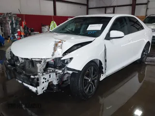 2014 Toyota Camry L with VIN 4T1BF1FKXEU306754, listed as a IAAI auction lot 41613218 with 195,692 mi miles. Bid and sale history available at carsss.com. Image 17.