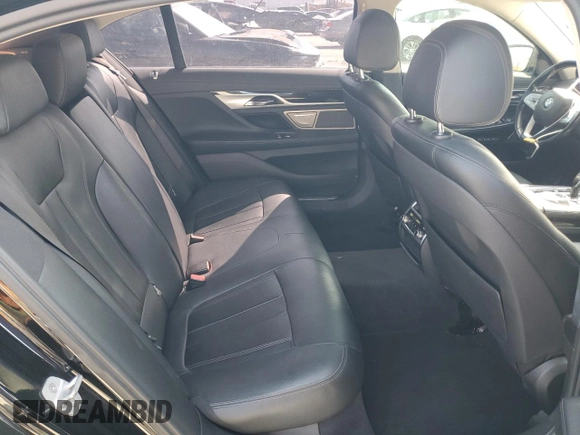 2017 BMW 7 Series 740i with VIN WBA7E2C50HG739565, listed as a Copart auction lot 64584885 with 114,496 mi miles and Salvage title. Bid and sale history available at DreamBid. Image 10.