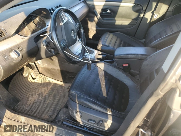 2010 Volkswagen CC Sport with VIN WVWMN7ANXAE564846, listed as a Copart auction lot 77343204 with 133,444 mi miles and Salvage Title. Bid and sale history available at DreamBid. Image 7.