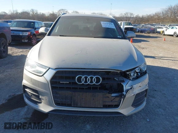 2017 Audi Q3 Premium Plus z VIN WA1JCCFS5HR011907, wystawiony jako IAAI lot #41675496 z przebiegiem 102 591 mil mil oraz . Historia ofert i sprzedaży dostępna na DreamBid. Obrazek 12.