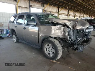 2007 Chevrolet Tahoe LS with VIN 1GNFC13C77R357122, listed as a Copart auction lot 53923835 with 139,996 mi miles and Salvage title. Bid and sale history available at DreamBid. Image 4.