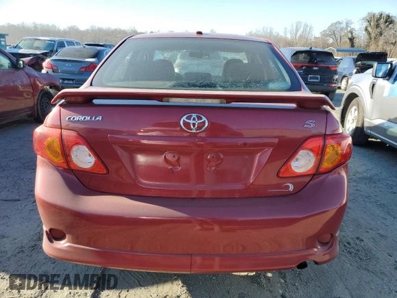 2010 Toyota Corolla with VIN 1NXBU4EE1AZ231682, listed as a Copart auction lot 84146264 with 194,949 mi miles and Salvage Title. Bid and sale history available at DreamBid. Image 6.