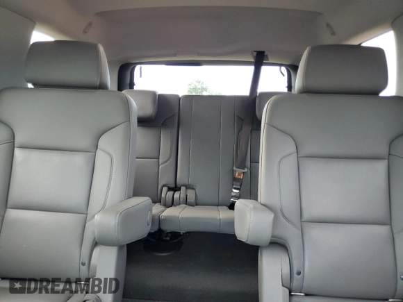 2020 Chevrolet Tahoe LT z VIN 1GNSKBKC7LR301863, wystawiony jako Copart lot #65205365 z przebiegiem 78 866 mil mil oraz Szkoda całkowita • Salvage title. Historia ofert i sprzedaży dostępna na DreamBid. Obrazek 10.
