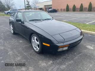 1987 Porsche 944 z VIN WP0AA2958HN152067, wystawiony jako Copart lot #53847675 z przebiegiem 46 994 mil mil oraz Szkoda całkowita • Salvage title. Historia ofert i sprzedaży dostępna na DreamBid. Obrazek 1.