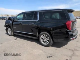 2023 GMC Yukon XL SLT z VIN 1GKS2GKD3PR282110, wystawiony jako Copart lot #52950425 z przebiegiem 99 147 mil mil oraz Szkoda całkowita • Salvage title. Historia ofert i sprzedaży dostępna na DreamBid. Obrazek 2.