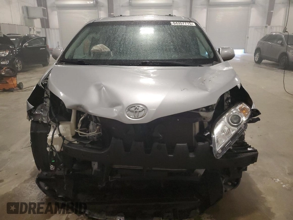 2017 Toyota Sienna XLE with VIN 5TDDZ3DC4HS166141, listed as a Copart auction lot 64357715 with 124,184 mi miles and Salvage title. Bid and sale history available at DreamBid. Image 5.