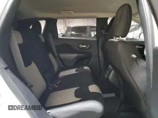 2014 Jeep Cherokee Sport with VIN 1C4PJLAB0EW320792, listed as a Copart auction lot 42204355 with 183,107 mi miles and Salvage Title. Bid and sale history available at DreamBid. Image 11.
