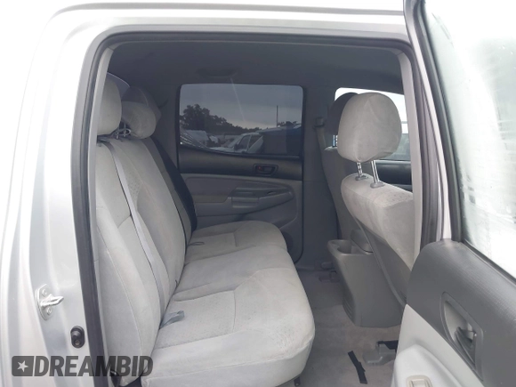 2006 Toyota Tacoma PreRunner z VIN 3TMJU62NX6M018693, wystawiony jako IAAI lot #42184797 z przebiegiem 193 953 mil mil oraz . Historia ofert i sprzedaży dostępna na DreamBid. Obrazek 8.