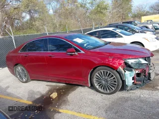 2016 Lincoln MKZ with VIN 3LN6L2JK1GR600996, listed as a IAAI auction lot 40903544 with 152,902 mi miles and . Bid and sale history available at DreamBid. Image 14.