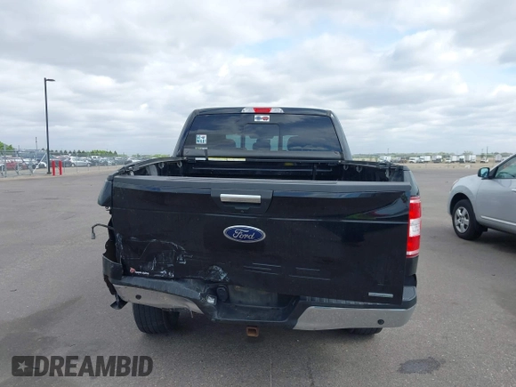 2018 Ford F-150 XL with VIN 1FTEW1EP6JKC24542, listed as a IAAI auction lot 42283242 with 127,608 mi miles and . Bid and sale history available at DreamBid. Image 16.