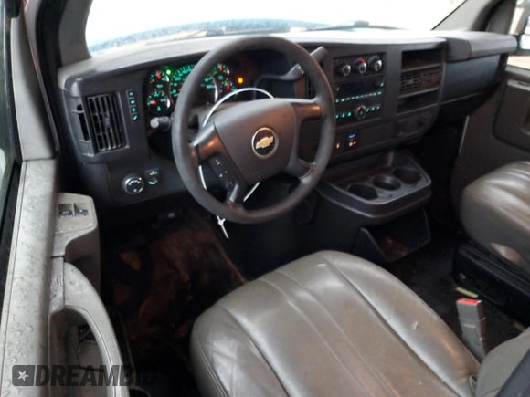 2015 Chevrolet Express Cargo with VIN 1GCWGFCF9F1276785, listed as a Copart auction lot 44939555 with 216,253 mi miles and Salvage title. Bid and sale history available at DreamBid. Image 8.