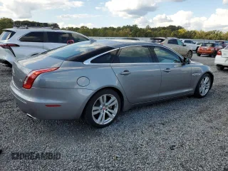 2015 Jaguar XJ Portfolio with VIN SAJWJ2GD2F8V75238, listed as a Copart auction lot 73633984 with 102,545 mi miles and Salvage title. Bid and sale history available at DreamBid. Image 3.
