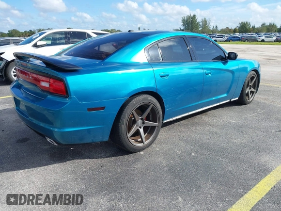 2012 Dodge Charger SXT with VIN 2C3CDXHG0CH185859, listed as a IAAI auction lot 40816799 with 132,572 mi miles. Bid and sale history available at carsss.com. Image 4.