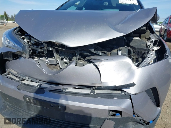2019 Toyota C-HR XLE with VIN JTNKHMBX9K1044591, listed as a IAAI auction lot 42012934 with 139,858 mi miles and . Bid and sale history available at DreamBid. Image 21.
