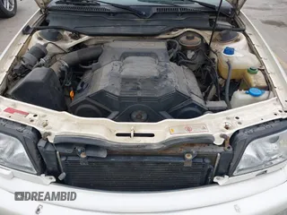 1996 Audi A6 z VIN WAUGA84A6TN084231, wystawiony jako IAAI lot #40940280 z przebiegiem 210 502 mil mil oraz . Historia ofert i sprzedaży dostępna na DreamBid. Obrazek 10.