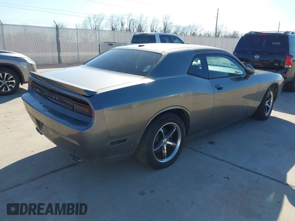 2012 Dodge Challenger SXT Plus with VIN 2C3CDYAG1CH262352, listed as a IAAI auction lot 41662002 with 141,868 mi miles. Bid and sale history available at carsss.com. Image 4.