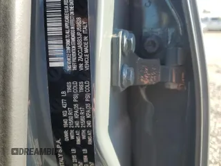 2018 Jeep Renegade Latitude z VIN ZACCJABB3JPJ59828, wystawiony jako Copart lot #42498775 z przebiegiem 92 448 mil mil oraz Szkoda całkowita • Salvage title. Historia ofert i sprzedaży dostępna na DreamBid. Obrazek 13.