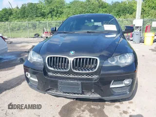 2014 BMW X6 xDrive35i with VIN 5UXFG2C5XE0C43526, listed as a IAAI auction lot 42121122 with 199,564 mi miles. Bid and sale history available at carsss.com. Image 12.