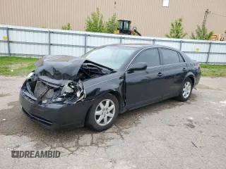 2007 Toyota Avalon XL z VIN 4T1BK36B37U168842, wystawiony jako Copart lot #57629505 z przebiegiem 216 850 mil mil oraz Czysty tytuł • Clean title. Historia ofert i sprzedaży dostępna na DreamBid. Obrazek 1.
