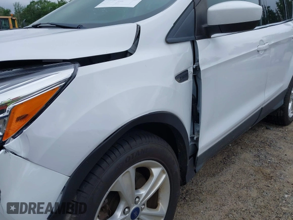 2014 Ford Escape SE with VIN 1FMCU9GX4EUE32062, listed as a IAAI auction lot 42710911 with 68,201 mi miles and . Bid and sale history available at DreamBid. Image 15.