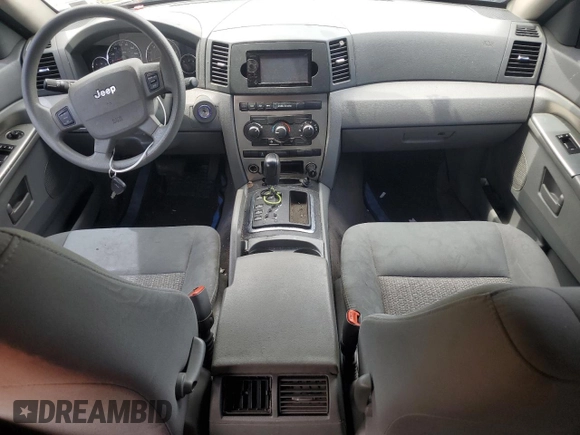 2007 Jeep Grand Cherokee Laredo z VIN 1J8GR48K47C681735, wystawiony jako Copart lot #59006435 z przebiegiem 195 517 mil mil oraz Nie do naprawy • Non repairable. Historia ofert i sprzedaży dostępna na DreamBid. Obrazek 8.