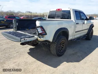 2010 Dodge Ram 1500 SLT with VIN 1D7RV1GT5AS227551, listed as a IAAI auction lot 41829058 with 123,397 mi miles. Bid and sale history available at carsss.com. Image 4.