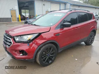 2018 Ford Escape SE z VIN 1FMCU9GD4JUA49819, wystawiony jako Copart lot #73023734 z przebiegiem 96 228 mil mil oraz Szkody całkowita. Historia ofert i sprzedaży dostępna na DreamBid. Obrazek 1.