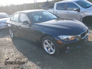 2015 BMW 3 Series 328i xDrive with VIN WBA3B3C57FF548161, listed as a IAAI auction lot 40383957 with 38,635 mi miles. Bid and sale history available at carsss.com. Image 1.