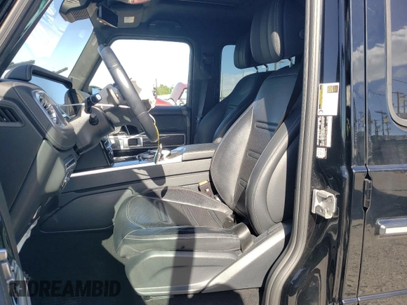 2023 Mercedes-Benz G 550 with VIN W1NYC6BJ3PX461528, listed as a Copart auction lot 87510075 with 19,992 mi miles and Salvage Title. Bid and sale history available at DreamBid. Image 7.