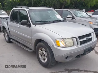 2002 Ford Explorer Sport Trac Value z VIN 1FMZU67EX2UB18161, wystawiony jako IAAI lot #42290334 z przebiegiem 192 498 mil mil oraz . Historia ofert i sprzedaży dostępna na DreamBid. Obrazek 1.
