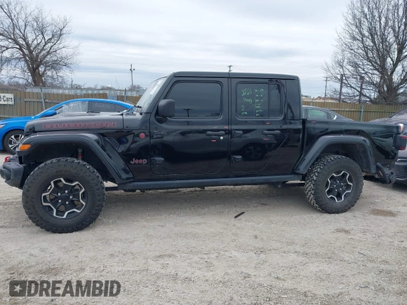 2022 Jeep Gladiator Rubicon with VIN 1C6JJTBG7NL145501, listed as a IAAI auction lot 41506842 with 20,593 mi miles and . Bid and sale history available at DreamBid. Image 14.